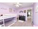 Bedroom with carpet featuring neutral walls, complemented by a white bunk bed and black dresser at 6164 Brighton Dr, Whitestown, IN 46075