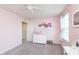 Comfortable bedroom with carpet featuring neutral walls and white trim, offering a serene atmosphere at 6164 Brighton Dr, Whitestown, IN 46075