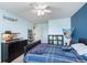 bedroom with carpet featuring a blue accent wall, offering a lively atmosphere at 6164 Brighton Dr, Whitestown, IN 46075