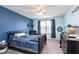 Bedroom with carpet, showcasing a modern ceiling fan and neutral walls, offering a relaxing retreat at 6164 Brighton Dr, Whitestown, IN 46075