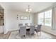 Dining room with seating for six and a large window at 6164 Brighton Dr, Whitestown, IN 46075