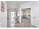 Inviting entryway with decorative console table and view of the front door at 6164 Brighton Dr, Whitestown, IN 46075