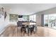 Inviting living room with a modern fireplace, built-in shelving, comfortable seating, and sliding glass doors to the outside at 6164 Brighton Dr, Whitestown, IN 46075