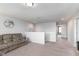 Open loft area with comfortable seating and view of upstairs hallway at 6164 Brighton Dr, Whitestown, IN 46075