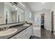 Spacious bathroom featuring double vanity, soaking tub, and walk-in closet for ample storage at 6195 Woodmill Dr, Fishers, IN 46038