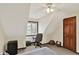 Bright bedroom featuring a comfortable desk area, natural light, and a ceiling fan for optimal airflow at 621 Thorne Dr, Brownsburg, IN 46112