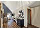 Hallway view into a living room with fireplace and high ceilings at 621 Thorne Dr, Brownsburg, IN 46112