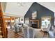 Bright living room features a fireplace, vaulted ceiling, and neutral color scheme at 621 Thorne Dr, Brownsburg, IN 46112