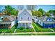 Traditional two-story home boasts a classic design and inviting curb appeal at 625 Arbor Ave, Indianapolis, IN 46221