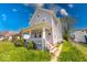 Charming two-story home featuring a covered front porch and well-maintained yard at 625 Arbor Ave, Indianapolis, IN 46221