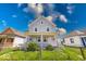 Traditional home boasting a fenced front yard and inviting covered entry at 625 Arbor Ave, Indianapolis, IN 46221