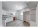 Kitchen featuring white cabinetry, modern countertops, and gray wood-look flooring at 625 Arbor Ave, Indianapolis, IN 46221