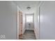 Convenient laundry area featuring gray wood-look floors and neutral paint colors at 625 Arbor Ave, Indianapolis, IN 46221