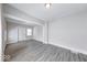 Spacious living room featuring neutral paint, base trim, and stylish gray floors at 625 Arbor Ave, Indianapolis, IN 46221