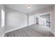 Bright living room showcasing hardwood floors and easy access to stairs at 625 Arbor Ave, Indianapolis, IN 46221