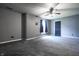 Spacious bedroom featuring a ceiling fan, and plush neutral carpeting throughout at 625 Maple St, Columbus, IN 47201