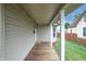 View of the covered front porch; the perfect space to enjoy the outdoors at 625 Maple St, Columbus, IN 47201