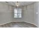 Cozy dining area illuminated by a charming chandelier and natural light at 6337 Whitaker Farms Dr, Indianapolis, IN 46237