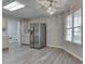 Eat in kitchen features stainless steel appliances, neutral cabinets, and wood flooring at 6337 Whitaker Farms Dr, Indianapolis, IN 46237