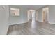 Gray walled living room with gray flooring offering an open layout and inviting atmosphere at 6337 Whitaker Farms Dr, Indianapolis, IN 46237
