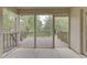 The screened-in porch offers views of the backyard and deck for relaxing or entertaining at 6337 Whitaker Farms Dr, Indianapolis, IN 46237
