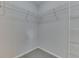 Spacious walk-in closet featuring adjustable shelving for optimal organization and storage solutions at 6337 Whitaker Farms Dr, Indianapolis, IN 46237