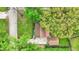 Bird's eye view of a property with a large lawn, garage, and driveway showcasing an expansive yard at 6837 Doris Dr, Indianapolis, IN 46214