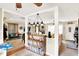 Open living area with lots of natural light and view to kitchen at 6837 Doris Dr, Indianapolis, IN 46214