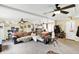 Spacious living room with an open floor plan and access to the kitchen area at 6837 Doris Dr, Indianapolis, IN 46214