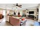 Open-concept living room with ceiling fans, generous seating, and great flow at 6837 Doris Dr, Indianapolis, IN 46214
