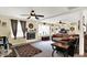 Spacious living room features a fireplace, large windows, and neutral decor at 6837 Doris Dr, Indianapolis, IN 46214