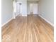 Bedroom featuring light hardwood flooring and great natural light from the window at 7108 Burlat Ln, Noblesville, IN 46062