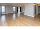 Open living area boasts wood floors, lots of natural light, and modern fixtures at 7108 Burlat Ln, Noblesville, IN 46062