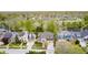 Neighborhood aerial view, showing landscaped lots, well maintained homes, and mature trees at 7653 Carriage House Way, Zionsville, IN 46077
