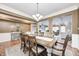 Large dining room with hardwood floors, recessed lighting, and ample seating at 7653 Carriage House Way, Zionsville, IN 46077