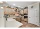 Kitchen with stainless steel appliances and wood cabinets at 7653 Carriage House Way, Zionsville, IN 46077
