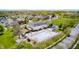 Community clubhouse and pool surrounded by manicured green space and residential buildings in a well-planned neighborhood at 7653 Carriage House Way, Zionsville, IN 46077