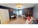 Well-lit bedroom featuring creative work spaces, custom artwork, and ample natural light at 7824 Gray Eagle Dr, Zionsville, IN 46077