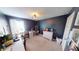 Bright bedroom with ample workspace, natural light, and creative design at 7824 Gray Eagle Dr, Zionsville, IN 46077