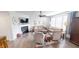 Cozy living room with fireplace, modern decor, neutral tones, and ample natural light at 7824 Gray Eagle Dr, Zionsville, IN 46077