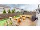 Cozy patio with stone pavers, built in fire pit, and comfortable Adirondack seating at 7824 Gray Eagle Dr, Zionsville, IN 46077