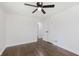 Bedroom featuring hardwood floors, a ceiling fan, and view to a closet at 7950 Westfield Blvd, Indianapolis, IN 46240