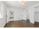 Bedroom boasts dark hardwood floors, and doors to the bathroom and closet at 7950 Westfield Blvd, Indianapolis, IN 46240