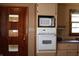 Kitchen with built-in microwave and oven appliances at 8341 N Washington St, Sheridan, IN 46069