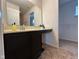 Bathroom featuring an extended vanity with a spacious sink area and storage beneath at 8409 Bolero Way, Camby, IN 46113