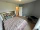 Cozy bedroom featuring carpet, neutral walls, and ample natural light at 8409 Bolero Way, Camby, IN 46113
