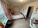 Bedroom featuring a window, carpet, and a tapestry on the back wall at 8409 Bolero Way, Camby, IN 46113