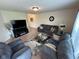Relaxing living room with comfortable sofas, stylish rug, and modern entertainment center at 8409 Bolero Way, Camby, IN 46113