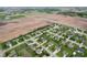 A beautiful aerial view of a well-maintained community with lush green lawns and mature trees at 901 Palomino Pl, Bargersville, IN 46106