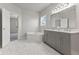 Bathroom featuring modern vanity and a soaking tub at 901 Palomino Pl, Bargersville, IN 46106
